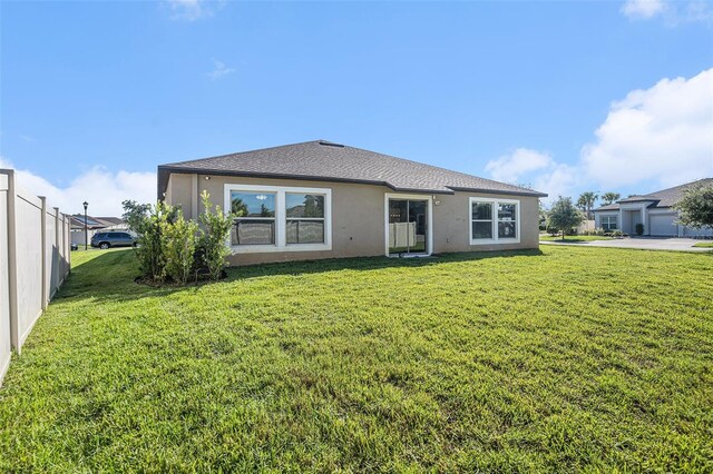 10211 Cakebread Ln, Riverview, FL 33578 - back of house with stucco siding