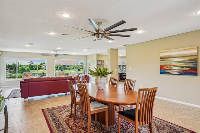 2110 W View Dr, Sun City Center, FL 33573 - dining area featuring plenty of natural light, ceiling fan, light tile patterned floors, recessed lighting, and a textured ceiling