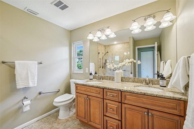 2110 W View Dr, Sun City Center, FL 33573 - bathroom featuring double vanity, a tile shower, and tile patterned floors