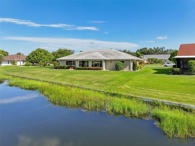 2110 W View Dr, Sun City Center, FL 33573 - rear view of house featuring a water view and a yard
