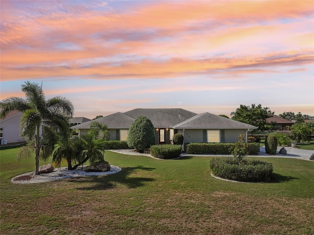2110 W View Dr, Sun City Center, FL 33573 - ranch-style home with a front lawn and stucco siding