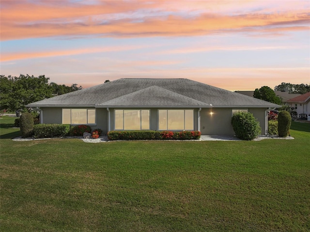 2110 W View Dr, Sun City Center, FL 33573 - view of front facade with a front yard and stucco siding