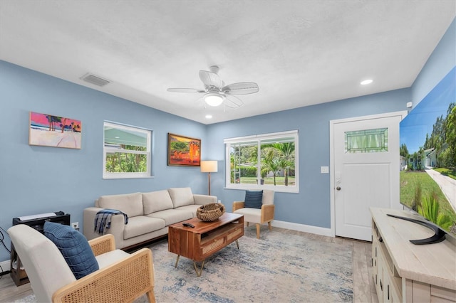 4718 24th Ave S, Saint Petersburg, FL 33711 - living area featuring a ceiling fan, light wood finished floors, and recessed lighting