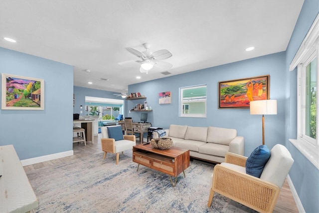 4718 24th Ave S, Saint Petersburg, FL 33711 - living area featuring a ceiling fan, wood finished floors, and recessed lighting