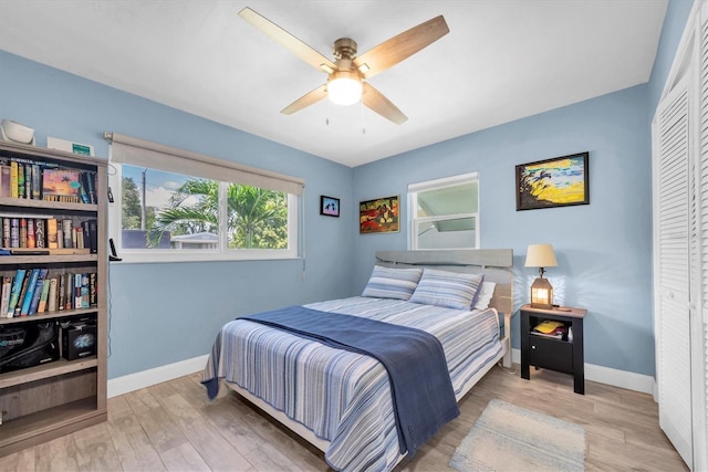 4718 24th Ave S, Saint Petersburg, FL 33711 - bedroom with wood finished floors, a closet, and a ceiling fan