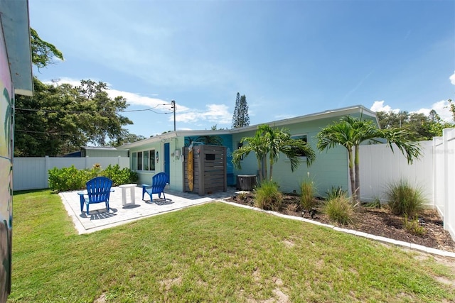 4718 24th Ave S, Saint Petersburg, FL 33711 - back of house with a patio area and a fenced backyard