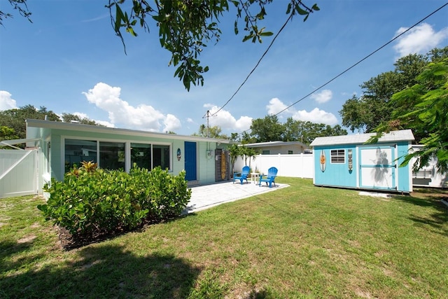 4718 24th Ave S, Saint Petersburg, FL 33711 - rear view of property with a patio area and a shed