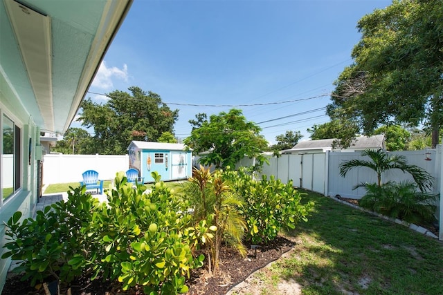 4718 24th Ave S, Saint Petersburg, FL 33711 - fenced backyard featuring a shed