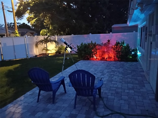 4718 24th Ave S, Saint Petersburg, FL 33711 - fenced backyard with a patio