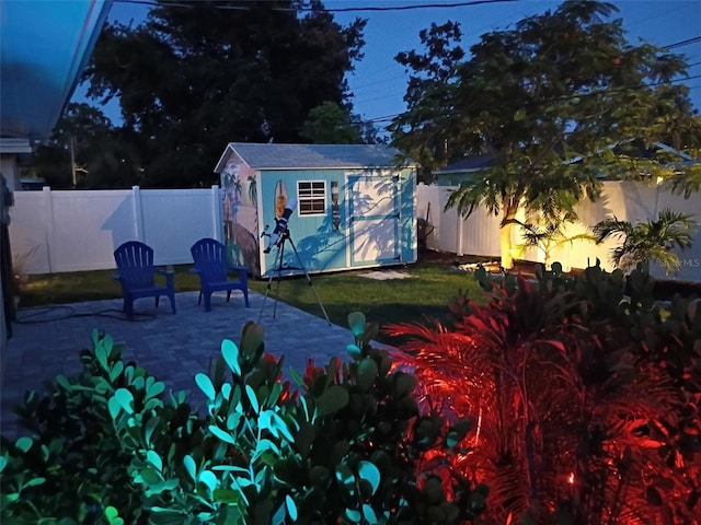 4718 24th Ave S, Saint Petersburg, FL 33711 - fenced backyard featuring a shed and a patio area