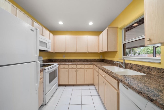 6530 68th St N, Pinellas Park, FL 33781 - kitchen featuring white appliances, light brown cabinetry, light tile patterned floors, and recessed lighting