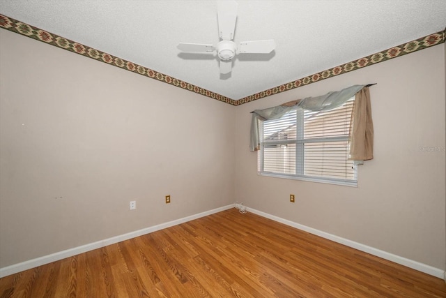 6530 68th St N, Pinellas Park, FL 33781 - spare room featuring light wood-style floors and a ceiling fan