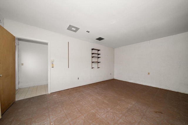 6530 68th St N, Pinellas Park, FL 33781 - spare room with tile patterned floors