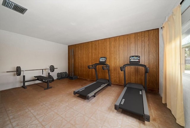 6530 68th St N, Pinellas Park, FL 33781 - workout room featuring wood walls
