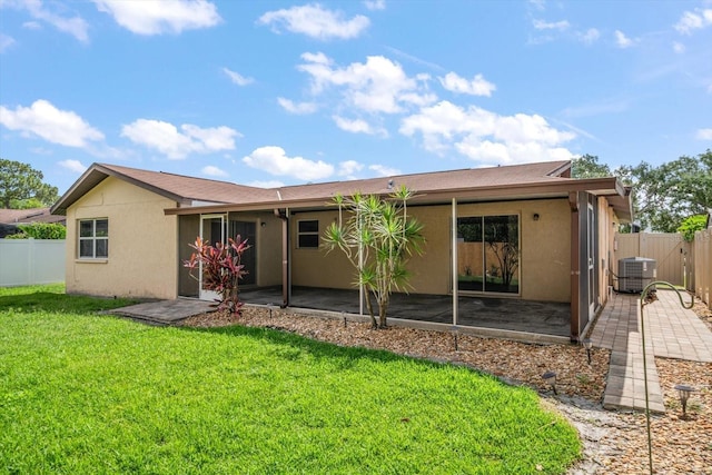 6530 68th St N, Pinellas Park, FL 33781 - back of house with stucco siding and a patio area