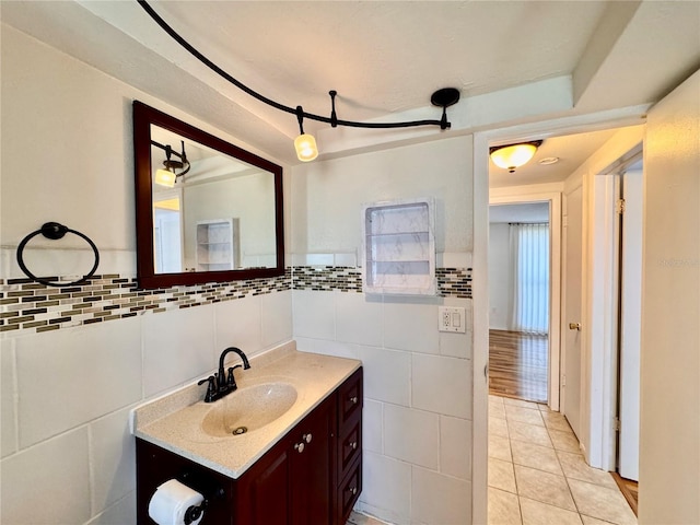 3902 Glissade Dr, New Port Richey, FL 34652 - bathroom featuring tile patterned floors, vanity, and tile walls