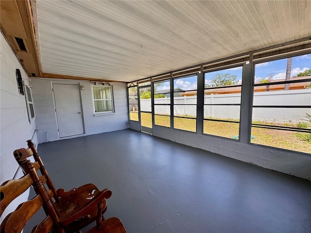 3902 Glissade Dr, New Port Richey, FL 34652 - unfurnished sunroom featuring plenty of natural light