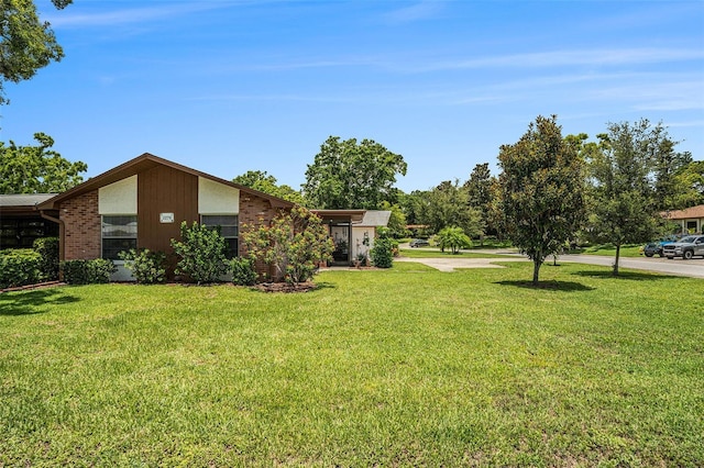 2270 Spruce Ln Unit B, Palm Harbor, FL 34684 - view of green lawn