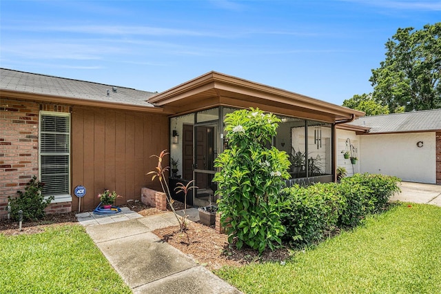 2270 Spruce Ln Unit B, Palm Harbor, FL 34684 - entrance to property featuring a yard