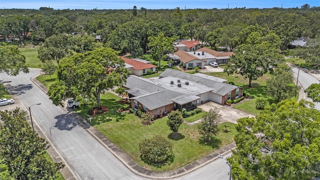 2270 Spruce Ln Unit B, Palm Harbor, FL 34684 - view from above of property with a forest