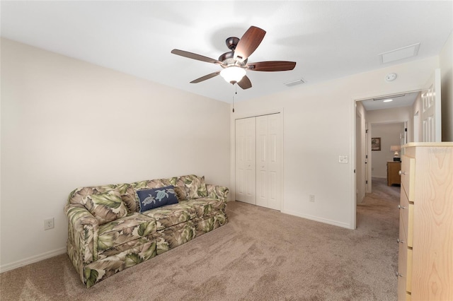 1032 Kelsea Cir, The Villages, FL 32159 - living area featuring carpet flooring, ceiling fan, and attic access