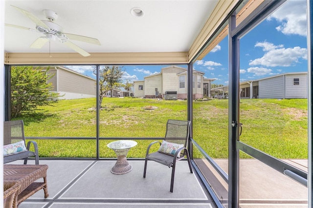 1032 Kelsea Cir, The Villages, FL 32159 - unfurnished sunroom featuring ceiling fan