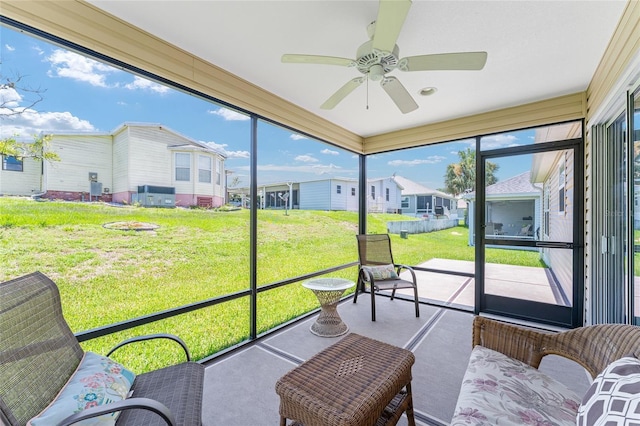 1032 Kelsea Cir, The Villages, FL 32159 - sunroom / solarium with a residential view and a ceiling fan