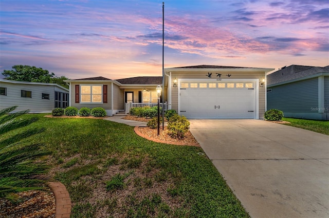 1032 Kelsea Cir, The Villages, FL 32159 - single story home with covered porch, a front yard, concrete driveway, and a garage