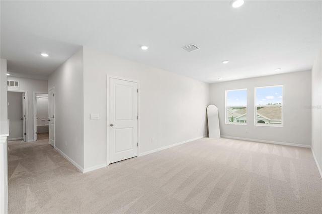 33675 Elm Hill Br, Wesley Chapel, FL 33545 - unfurnished room with light carpet and recessed lighting