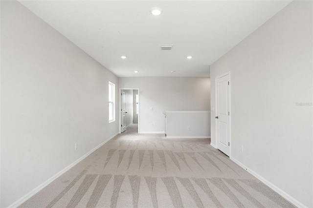 33675 Elm Hill Br, Wesley Chapel, FL 33545 - spare room featuring light carpet and recessed lighting