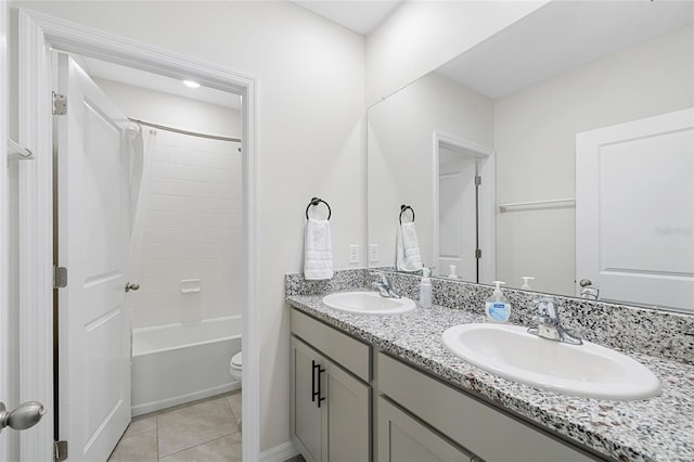 33675 Elm Hill Br, Wesley Chapel, FL 33545 - bathroom with double vanity, shower / bath combo with shower curtain, and tile patterned floors