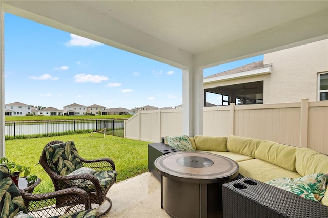 33675 Elm Hill Br, Wesley Chapel, FL 33545 - fenced backyard with a water view, an outdoor living space, a residential view, and a patio