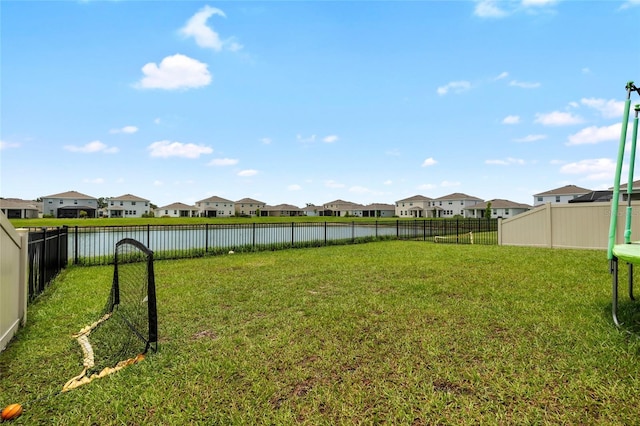 33675 Elm Hill Br, Wesley Chapel, FL 33545 - fenced backyard featuring a residential view and a water view