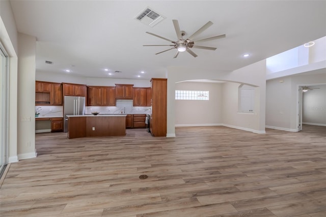 5224 Fairway One Dr, Valrico, FL 33596 - kitchen with open floor plan, ceiling fan, light countertops, and recessed lighting