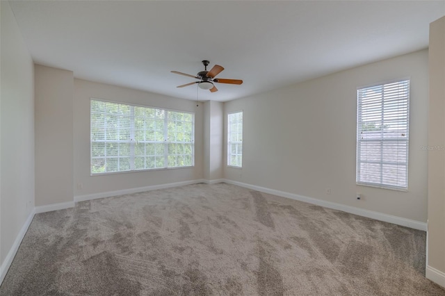 5224 Fairway One Dr, Valrico, FL 33596 - carpeted spare room with healthy amount of natural light and ceiling fan
