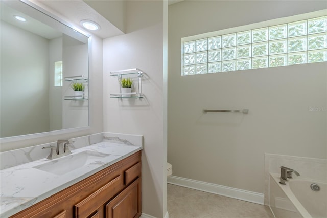 5224 Fairway One Dr, Valrico, FL 33596 - bathroom with vanity, a garden tub, tile patterned flooring, and recessed lighting
