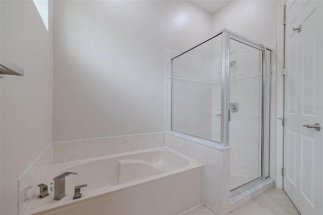 5224 Fairway One Dr, Valrico, FL 33596 - full bathroom featuring a bath and a stall shower