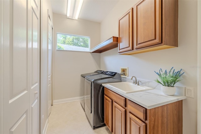 5224 Fairway One Dr, Valrico, FL 33596 - laundry area with washing machine and dryer and cabinet space