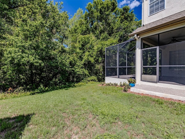 5224 Fairway One Dr, Valrico, FL 33596 - view of grassy yard featuring a lanai