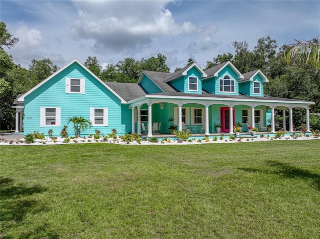 7427 20th St, Zephyrhills, FL 33540 - view of front of property featuring a porch and a front lawn