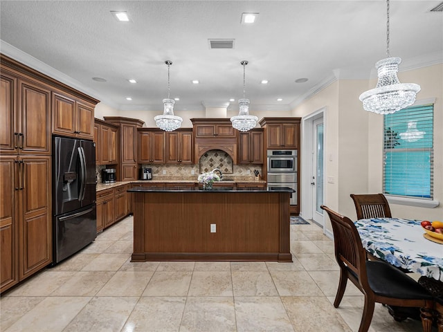7427 20th St, Zephyrhills, FL 33540 - kitchen with black refrigerator with ice dispenser, backsplash, ornamental molding, a chandelier, and hanging light fixtures