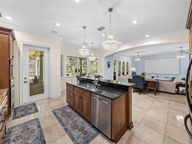 7427 20th St, Zephyrhills, FL 33540 - kitchen featuring stainless steel appliances, ceiling fan, a chandelier, crown molding, and dark stone counters