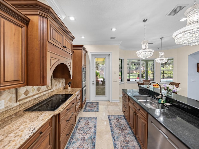 7427 20th St, Zephyrhills, FL 33540 - kitchen featuring a chandelier, black electric cooktop, brown cabinetry, stainless steel dishwasher, and crown molding
