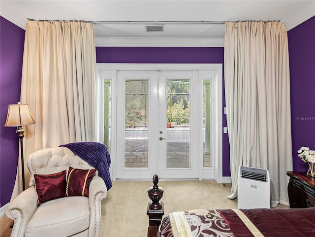 7427 20th St, Zephyrhills, FL 33540 - bedroom featuring french doors, access to outside, carpet, and crown molding