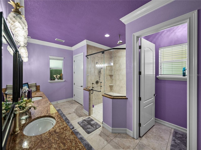 7427 20th St, Zephyrhills, FL 33540 - bathroom with a stall shower, double vanity, crown molding, plenty of natural light, and a textured ceiling