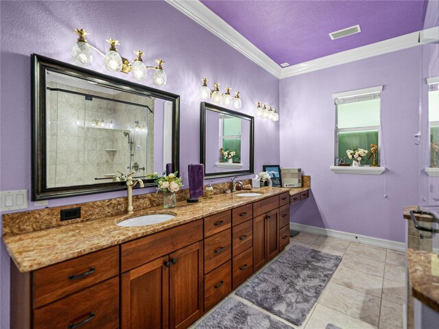 7427 20th St, Zephyrhills, FL 33540 - bathroom featuring crown molding, double vanity, tile patterned flooring, and an enclosed shower