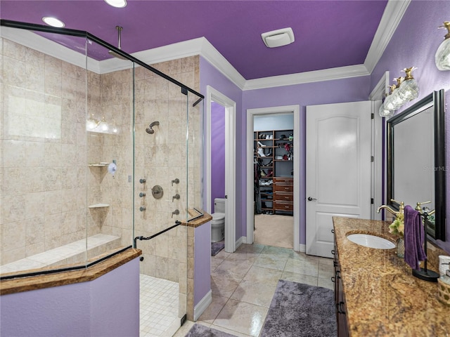 7427 20th St, Zephyrhills, FL 33540 - full bathroom with a stall shower, ornamental molding, vanity, and a spacious closet