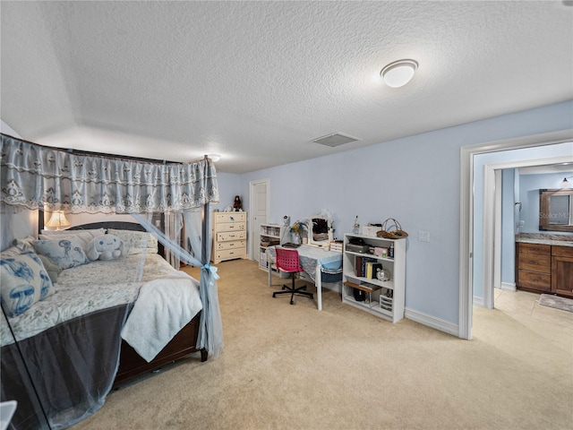 7427 20th St, Zephyrhills, FL 33540 - bedroom with light carpet and a textured ceiling
