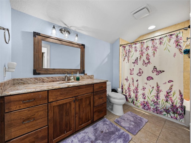 7427 20th St, Zephyrhills, FL 33540 - bathroom with vanity, tile patterned flooring, and shower / bath combination with curtain