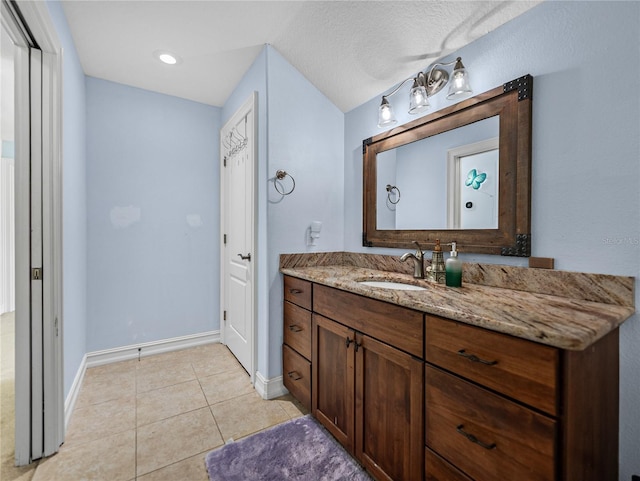 7427 20th St, Zephyrhills, FL 33540 - bathroom with vanity and tile patterned floors